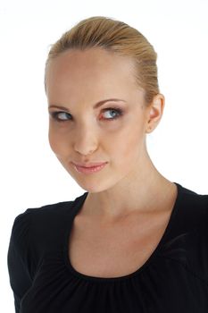 Close-up portrait of blond young woman looking away.