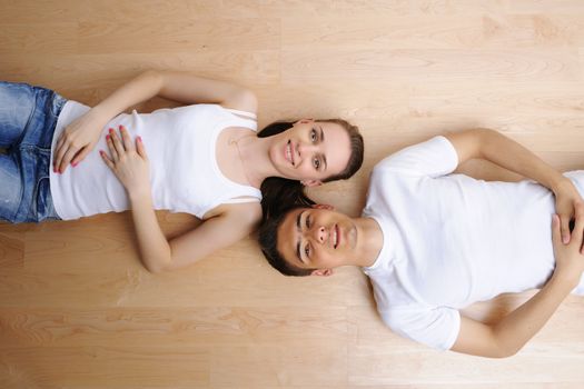 Young couple resting from moving into a new home