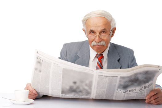 Portrait of an elder happy man reading a newspaper