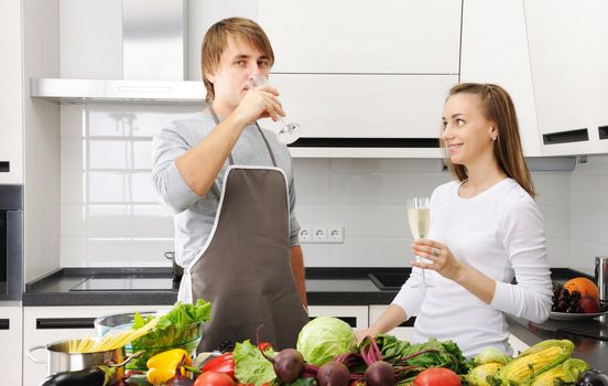 Couple cooking in modern kitchen