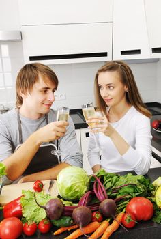 Couple cooking in modern kitchen