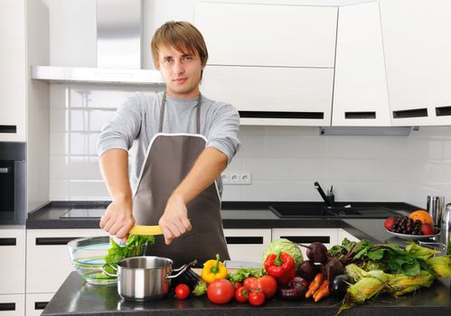 Man cooking in modern kitchen