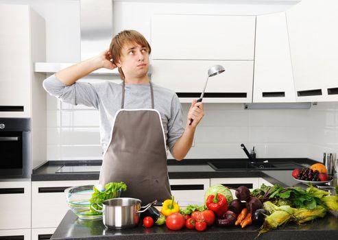 Man cooking in modern kitchen