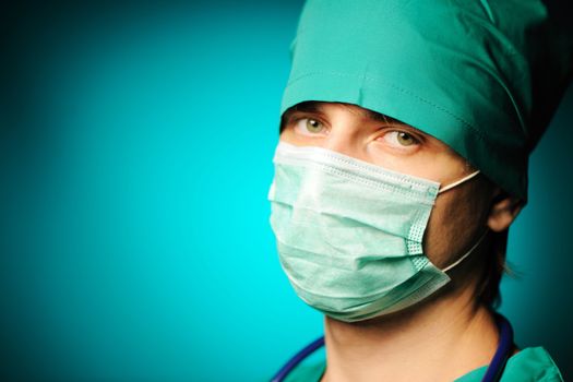 Surgeon in mask close-up portrait