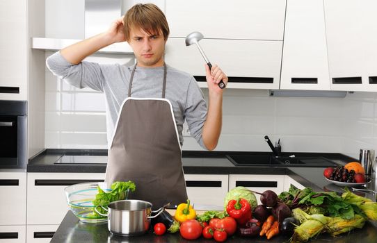 Man cooking in modern kitchen