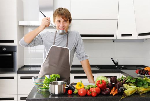 Man cooking in modern kitchen