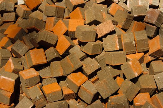 Stack of raw bricks texture