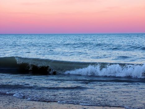 Waves under a beautiful Lake Michigan sunset at Illinois Beach State Park.