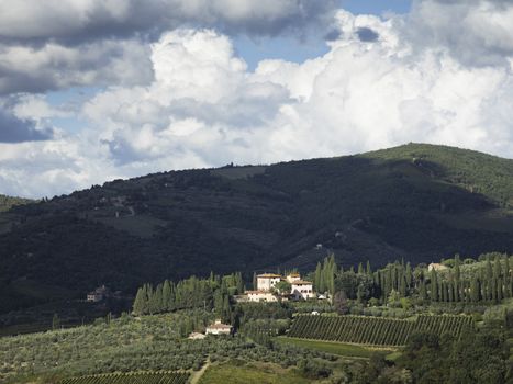 green hill in the field of tuscany