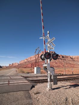 railroad and road sign in red canyon