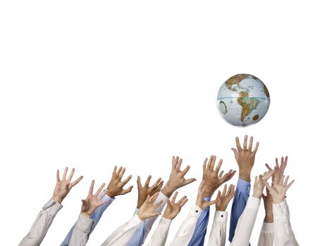 multi ethnic hands reaching for globe ball