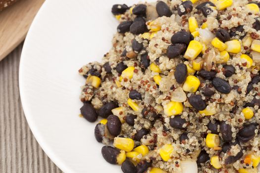 Vegan meal of mixed quinoa with corn and black beans.