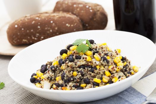 Vegan meal of mixed quinoa with corn and black beans.
