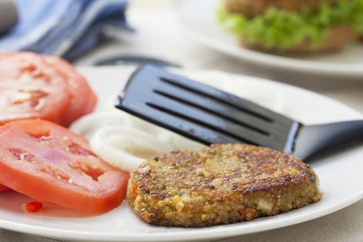 Quinoa burger patty ready to be put on a bun.