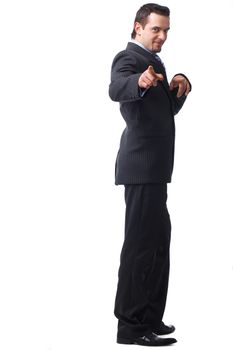  Full length portrait of business man pointing to you with both hands over white background 