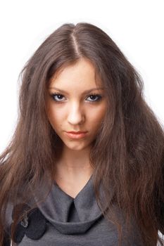 Close-up portrait of a beautiful young model over white bacground.