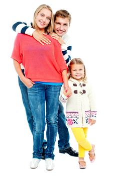 Portrait of a young happy family with girl child on white background