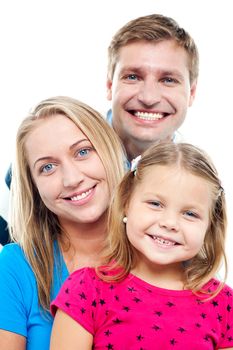 Husband posing with his adorable wife and daughter. All against white background