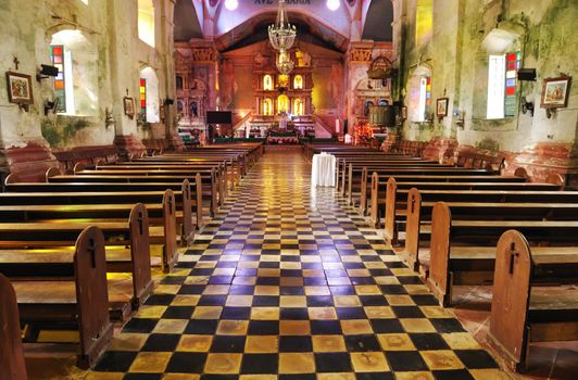 Inside of a very old catholic church
