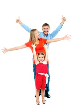 Beautiful happy smiling family of three people with young daughter, indoors