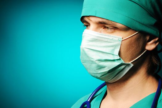 Surgeon in mask close-up portrait