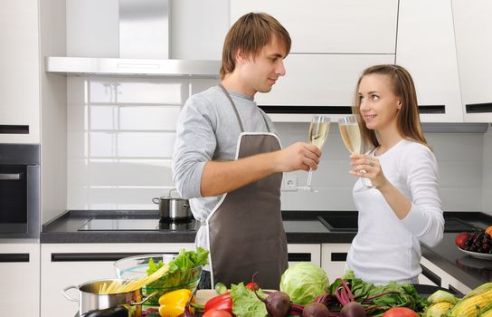 Couple cooking in modern kitchen