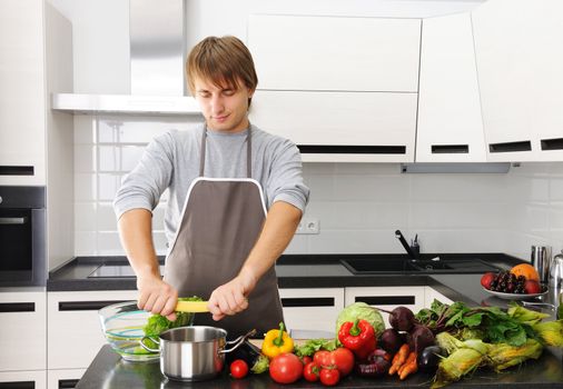 Man cooking in modern kitchen