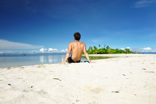 Man on a tropical beach