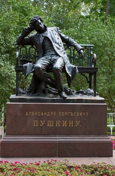 Bronze monument to Pushkin in  park of Peterhof, Russia.
