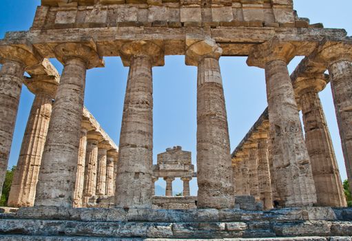 The main features of the site today are the standing remains of three major temples in Doric style, dating from the first half of the 6th century BC