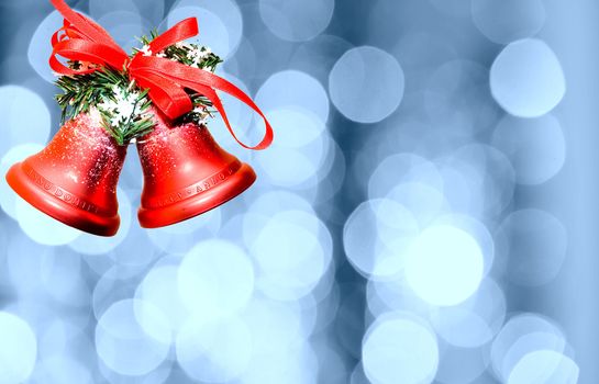 Christmas bells against defocused background with shallow depth of field and copyspace