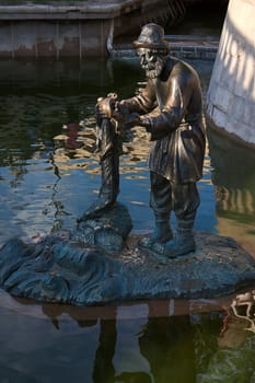 View of  bronze sculpture  fisherman, Moscow, Russia.