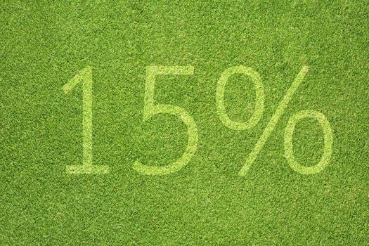 Percent icon on green grass texture and background 