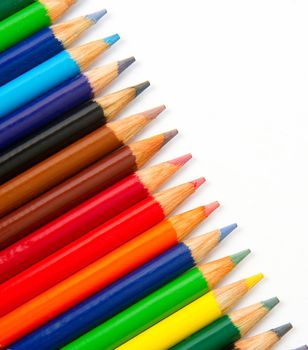 A diagonal view of Colored Lead Pencils on a white backgound