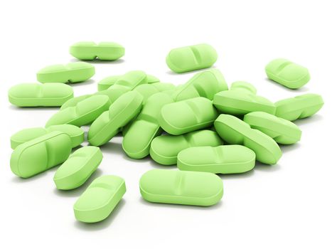 Many green pills isolated on white background