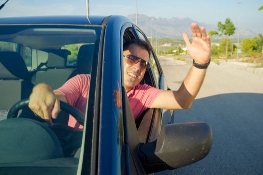 Driver hanging out of his car window gesticulating