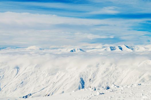 Snow mountains on bright winter day