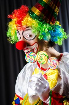 Funny clown in the studio shooting