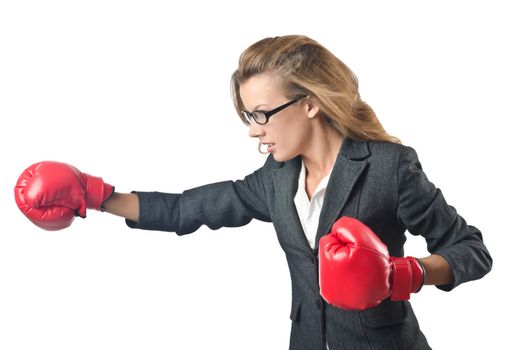 Young businesswoman in boxing concept