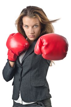 Young businesswoman in boxing concept