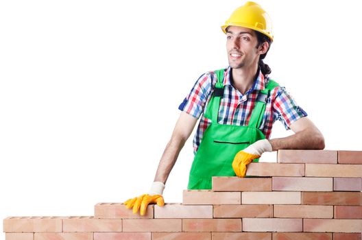 Builder with hard hat on white