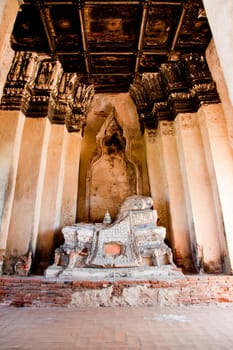 remains of buddha image in wat chai wattanaram, ayutthaya, thailand