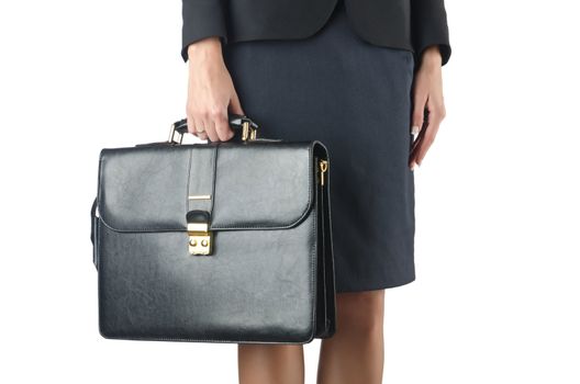 Close up of briefcase and businesswoman