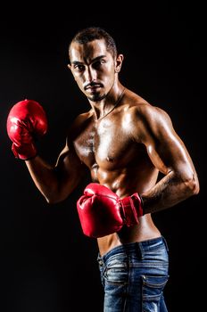 Young man with boxing gloves