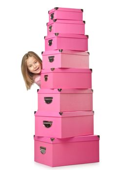 Little cute girl with lots of boxes