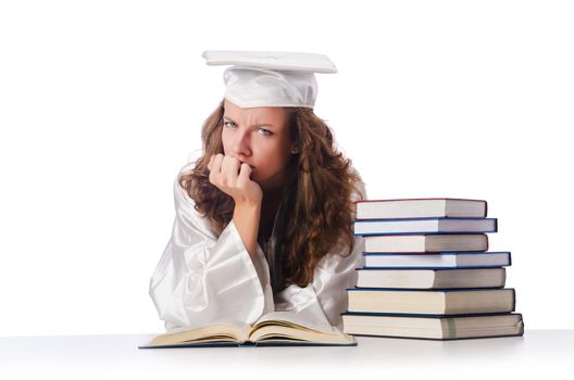 Happy graduate with lots of books on white