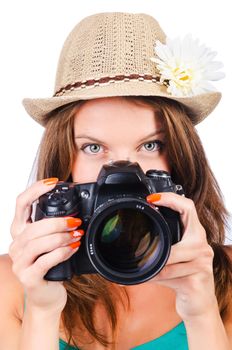 Attractive female photographer on white