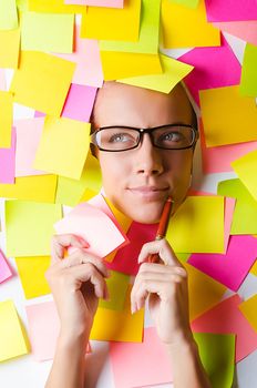 Woman with lots of reminder notes