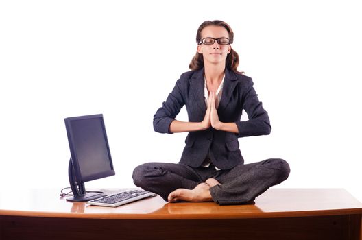 Woman meditating on the desk