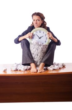 Woman with lots of discarded paper